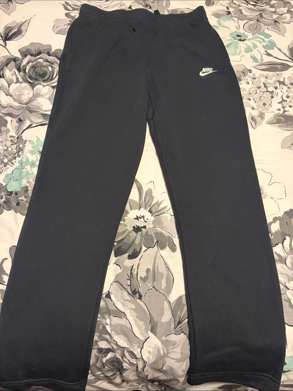 Nike Kids Black Sweatpants with White Swoosh